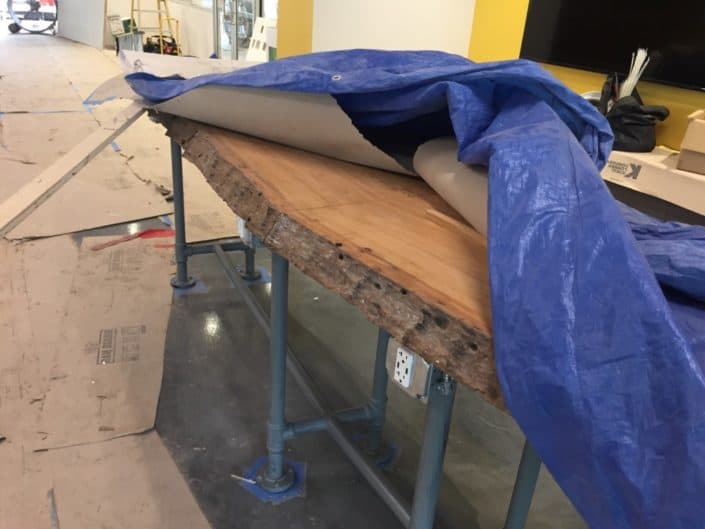 coquina club slab table Heart Cypress Feature Walls and Paneling a Focal Point of University of South Florida’s Coquina Club