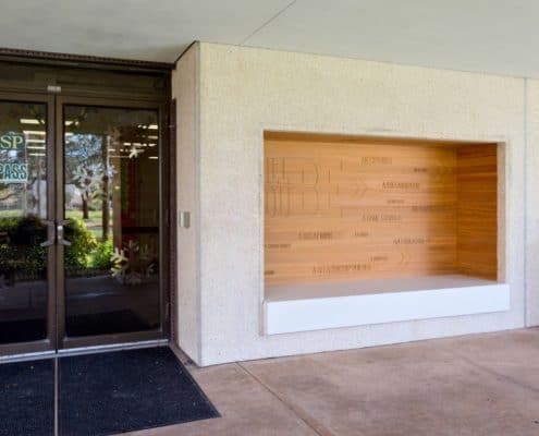BFrank Studio’s attention to detail even included an exterior accent wall routed with inspirational text and applied into an alcove bench.