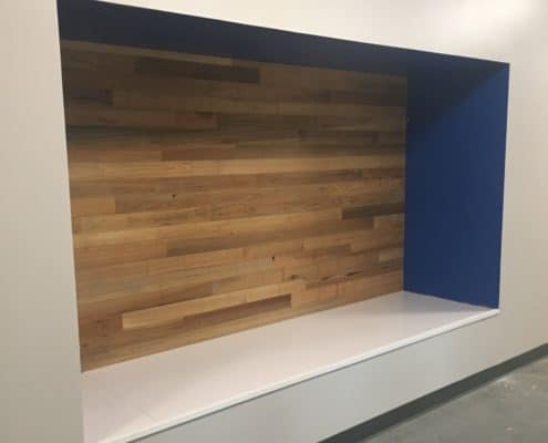 River-Recovered Heart Cypress Feature Walls and Reading Nooks Tell a Story of Sustainably at One Florida School